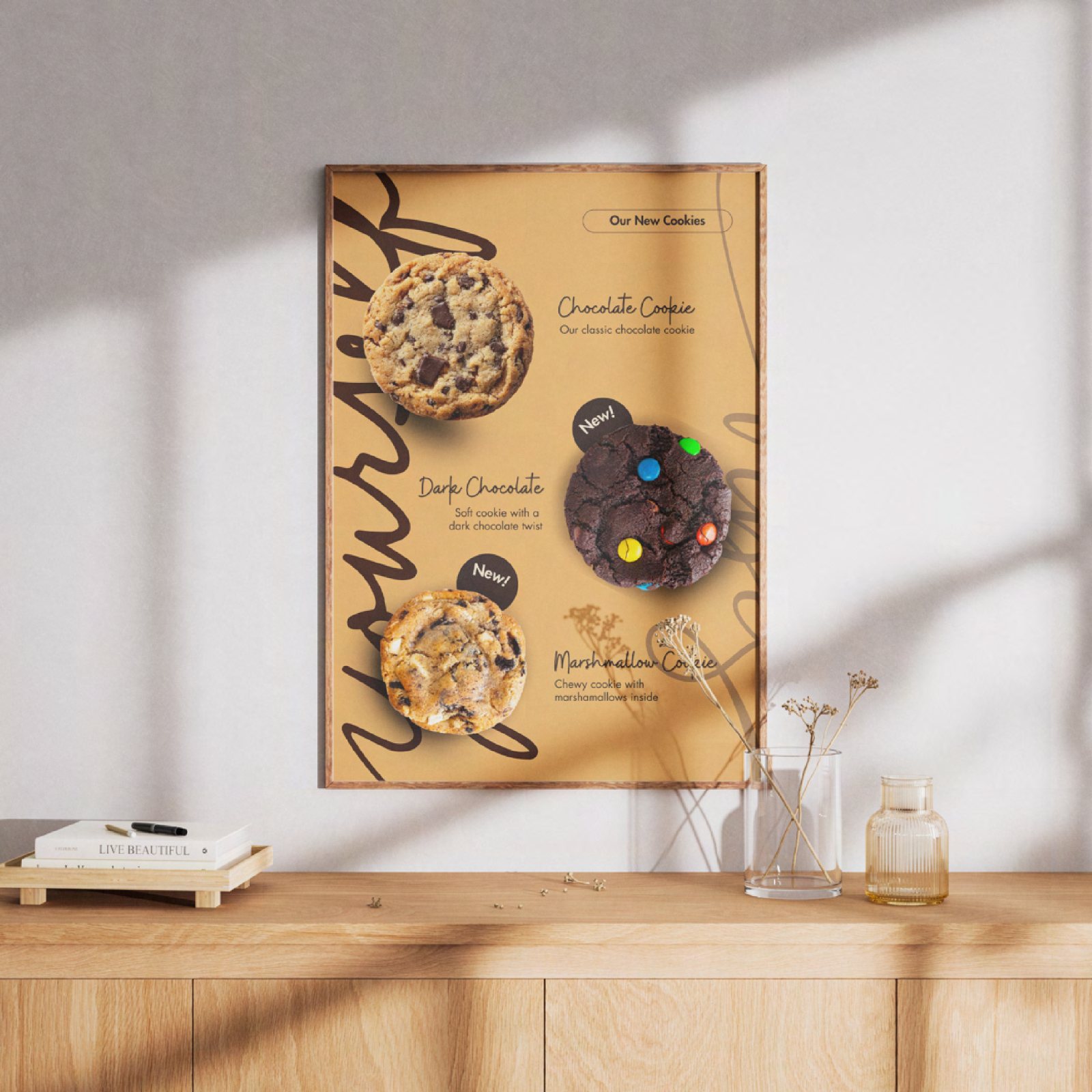 A framed cookie selection poster propped on a shelf in a bright interior.