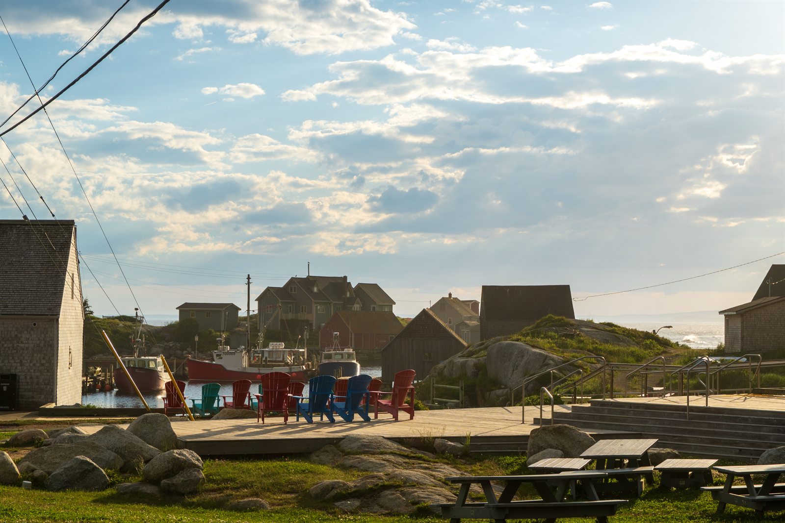 Peggy's Cove village and harbour at golden hour.